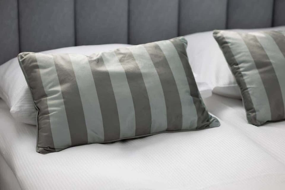 Decorative detail / bed with cushions.