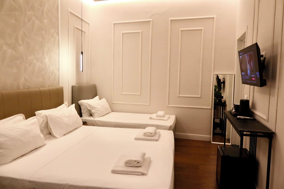 Standard Triple Room | Hypo-allergenic bedding, down comforters, in-room safe, desk