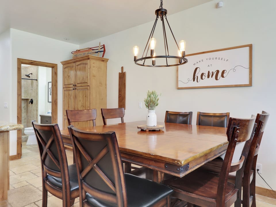Dining Room with Seating for 8 and Custom Chandelier