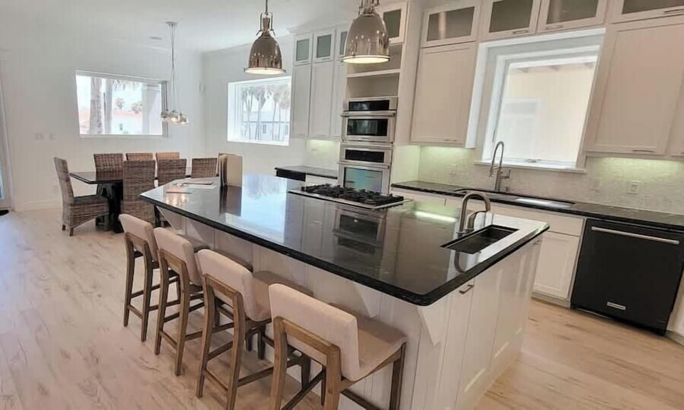 House, Multiple Beds, Pool Access (Padre Beach House) | Private kitchen | Fridge, oven, stovetop, dishwasher
