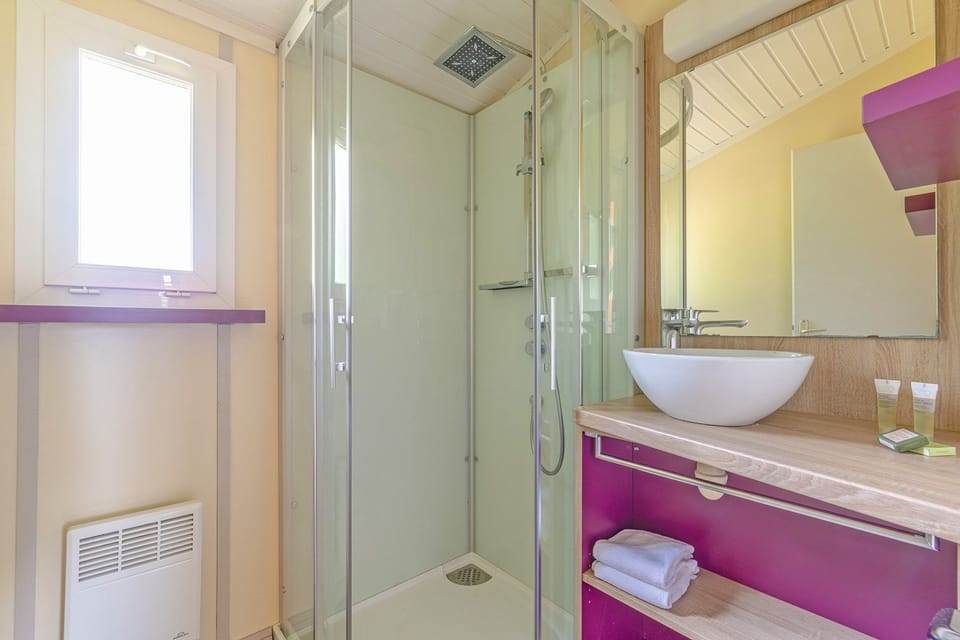 Get ready for your day in the lovely bathroom with shower.