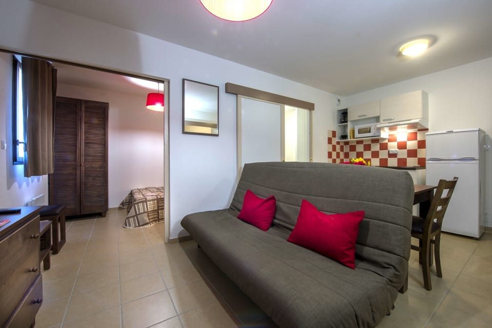 Sink into the cozy sofa after a day exploring the area.