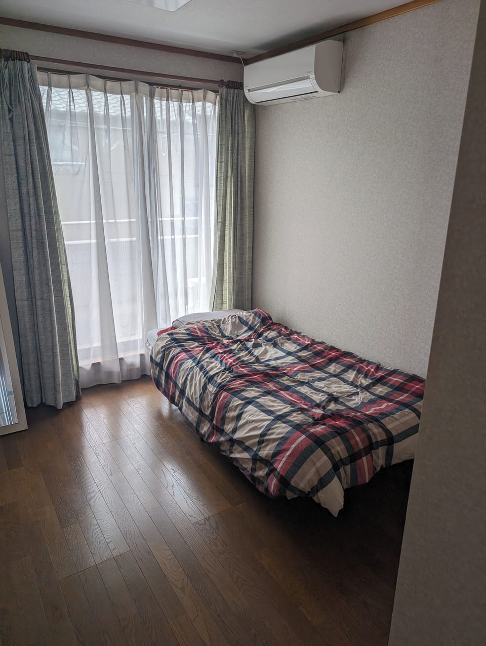 Economy Double Room, Non Smoking, Shared Bathroom | Blackout drapes, iron/ironing board