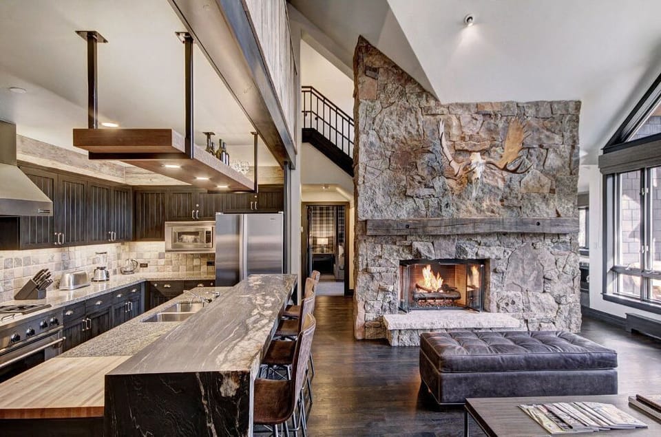 Cook in our gourmet kitchen, featuring an open-concept design, high-end appliances, and a large island. Perfect for culinary enthusiasts and socializing.