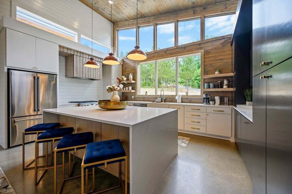Gather in this beautiful kitchen fully stocked for preparing meals during your stay