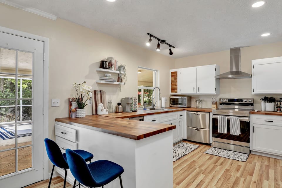 Fully stocked kitchen with bar stool counter