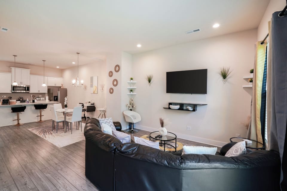 Open concept layout, seamlessly connecting with the dining and kitchen area.