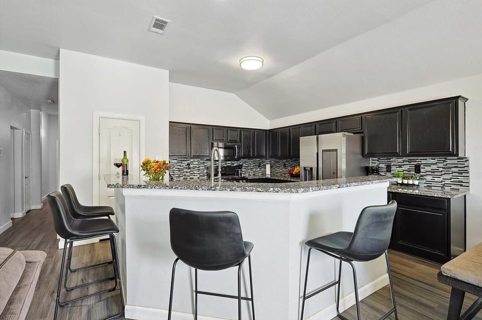 Bar area located right next to the kitchen for added comfort!