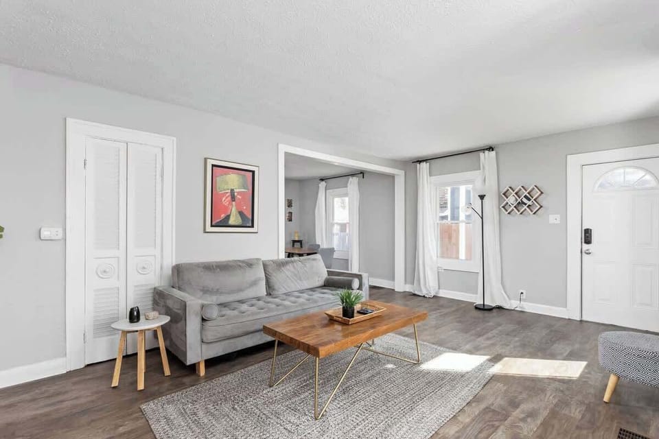 Our living room includes modern design, high-speed internet, and a plush sofa and chairs!