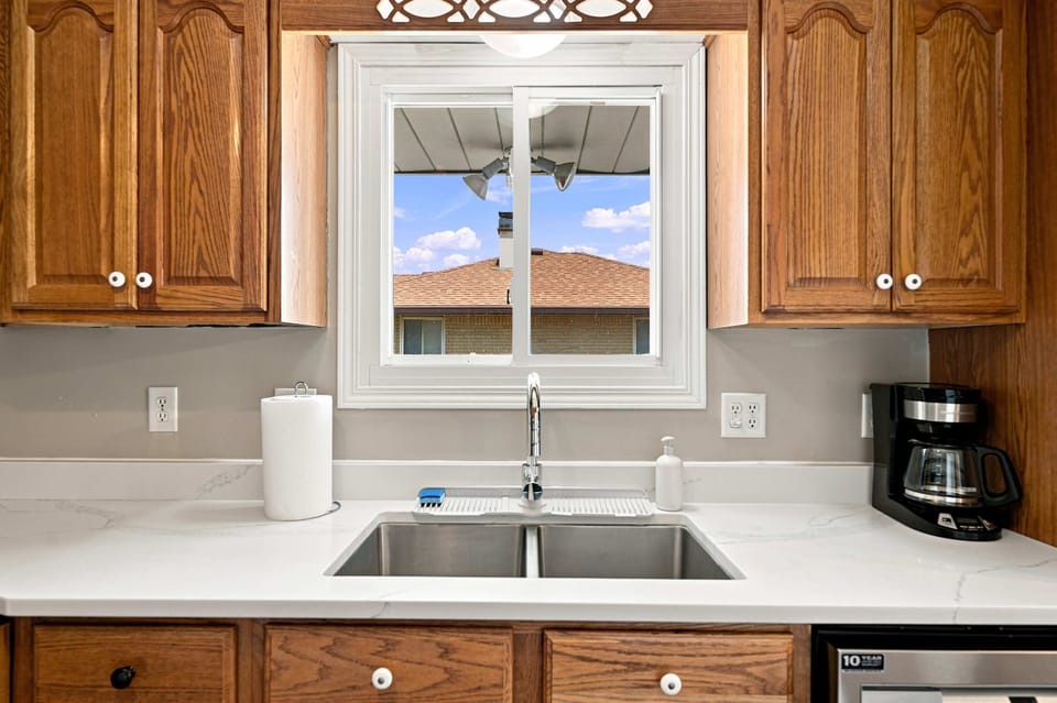 Kitchen with double sink and expansive prep space