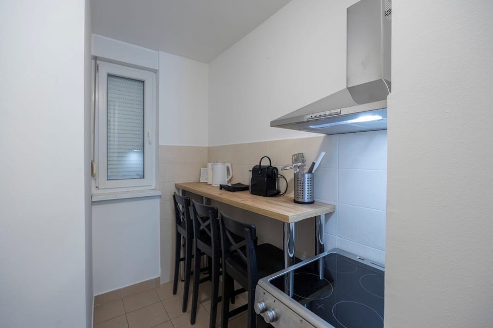 Family Apartment | Private kitchen | Full-size fridge, oven, stovetop, espresso maker