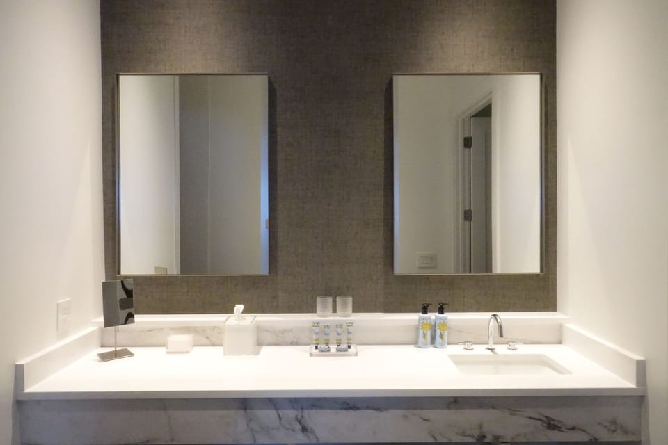 Luxury Room, 1 King Bed, Non Smoking | Bathroom | Shower, hair dryer, bathrobes, towels