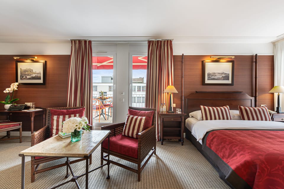 Junior Suite, Terrace | Minibar, in-room safe, desk, laptop workspace