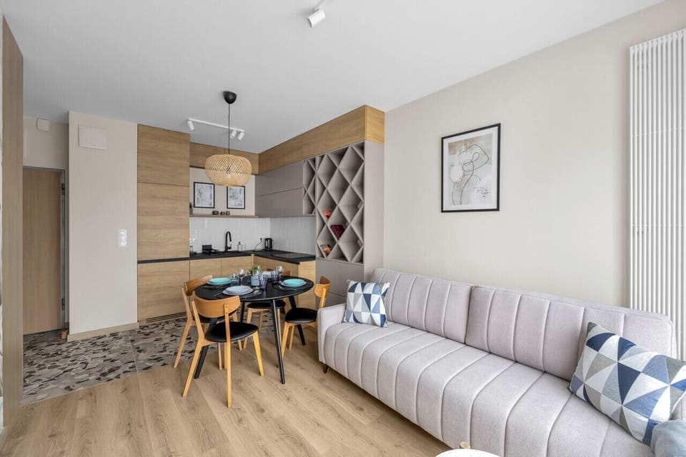 Comfortable Living Room with Sofa Bed and Smart TV | Book Now with RENTUJEMY