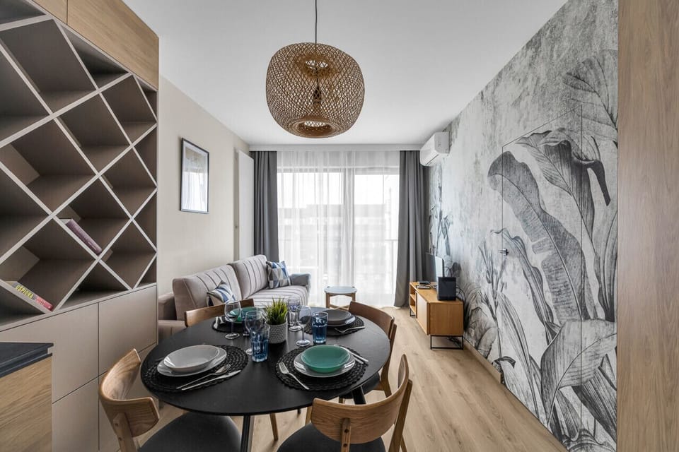 Comfortable Living Room with Sofa Bed and Smart TV | Book Now with RENTUJEMY