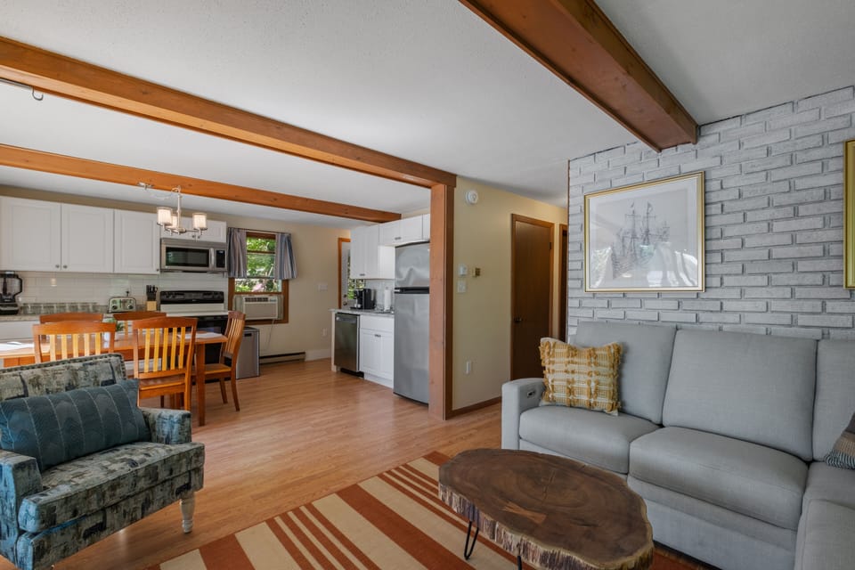 Furniture, Indoors, Living Room, Couch, Floor