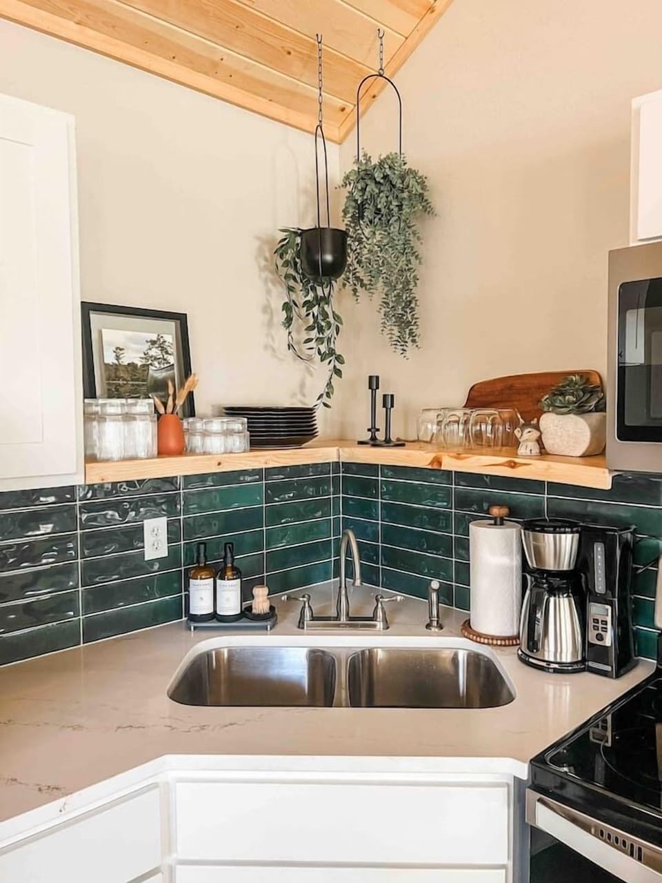 Our fully stocked kitchen includes a setting for 8 along with wine glasses, pots and pans, strainer, cutting boards, baking sheets, and a regular coffee pot. 