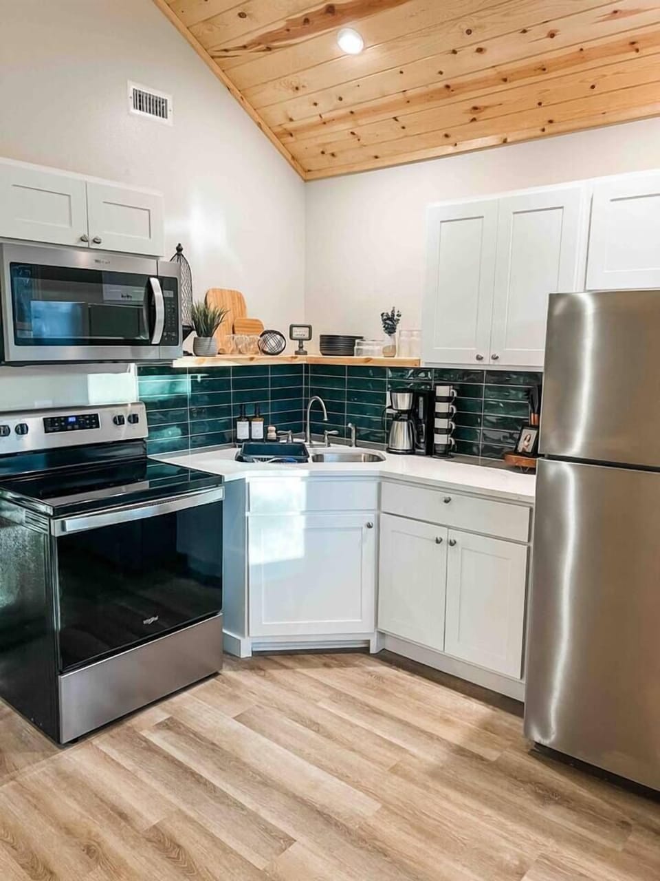 Our fully stocked kitchen includes set of six dishes, pots and pans, baking sheets, strainer, and a regular coffee pot. 