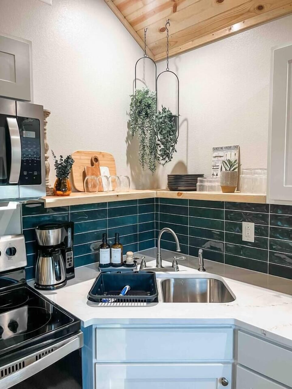 We have a fully stocked kitchen including dishes for six, pots and pans, strainer, baking sheets, and a regular coffee pot. 