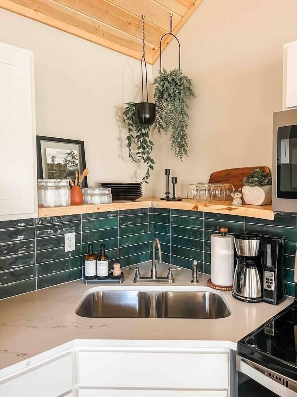 Our fully stocked kitchen includes a setting for 8 along with wine glasses, pots and pans, strainer, cutting boards, baking sheets, and a regular coffee pot. 