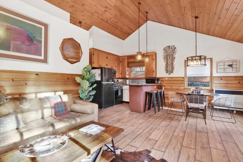 Living room opens to kitchen and dining area