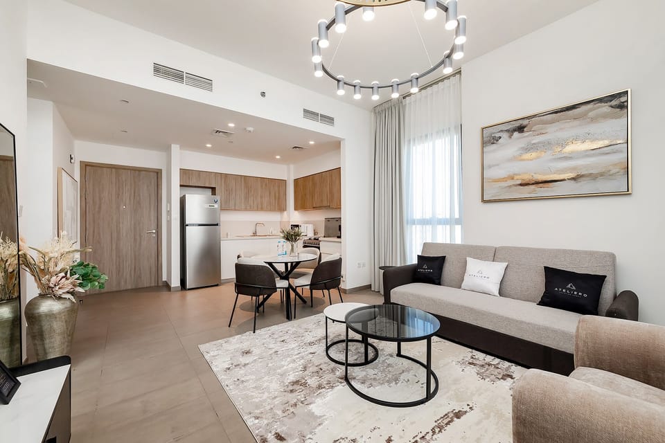 Premium Apartment, 1 Bedroom, Balcony, City View | Living room | 50-inch Smart TV with digital channels