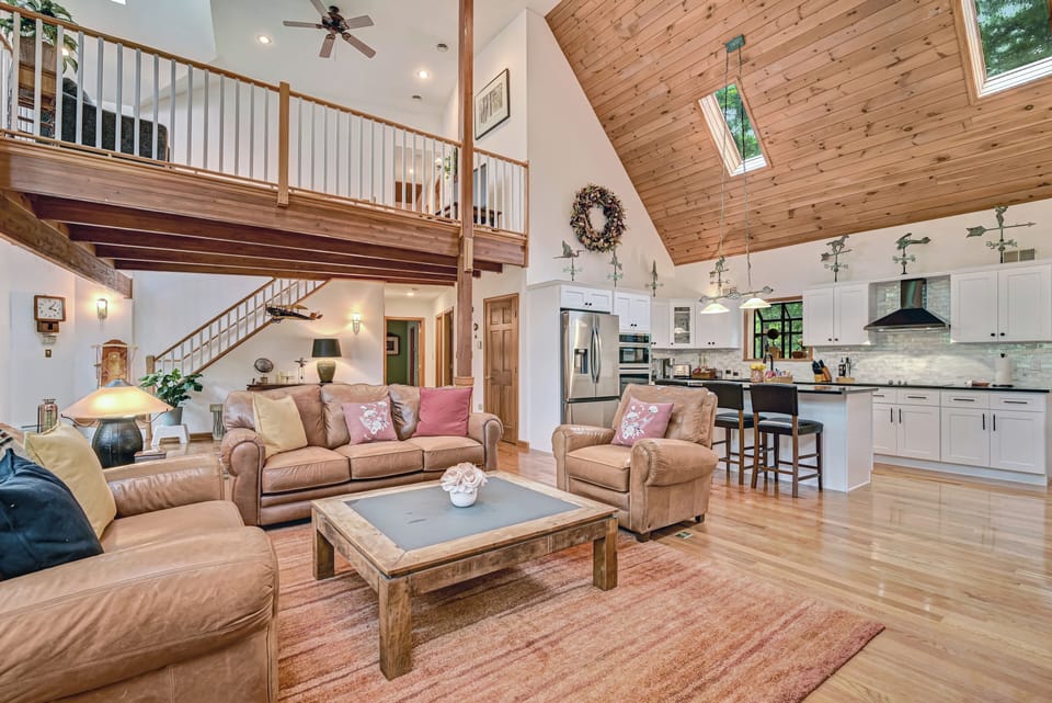 Living room with chef’s open kitchen