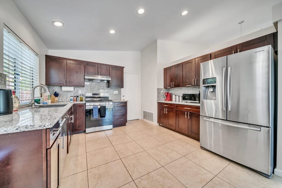 Fully equipped kitchen area perfect for home-cooked meals.