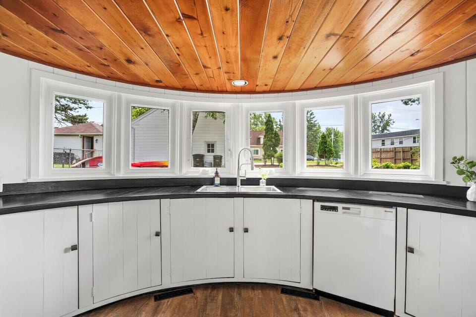 Kitchen is fully stocked with cooking and dining necessities