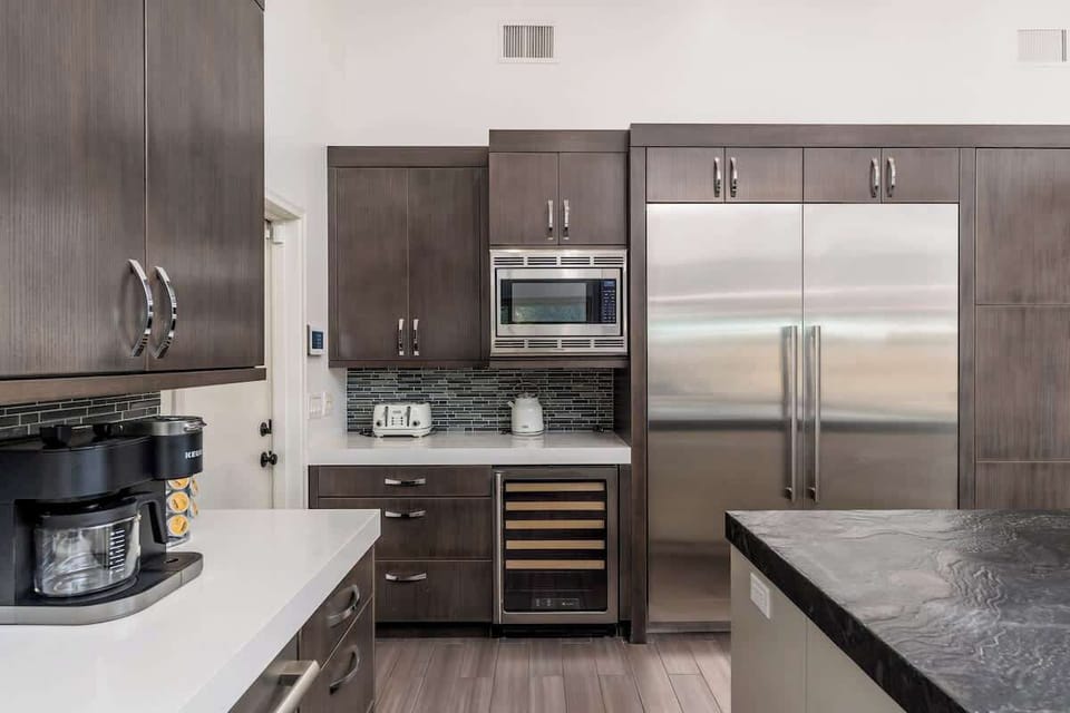 Your gourmet kitchen features stainless steel appliances, sleek cabinetry, and modern conveniences that make cooking a pleasure during your stay.