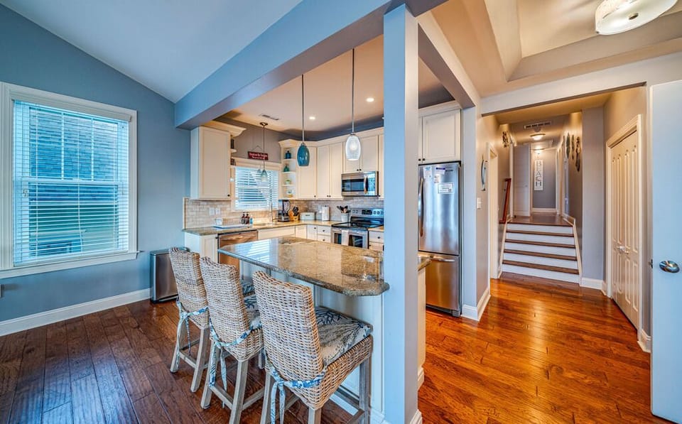 Kitchen island with three bar stools
