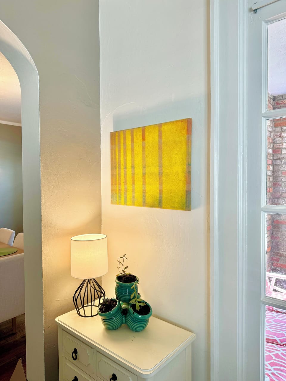 Adding to the vibe, are plants and original art around every corner.