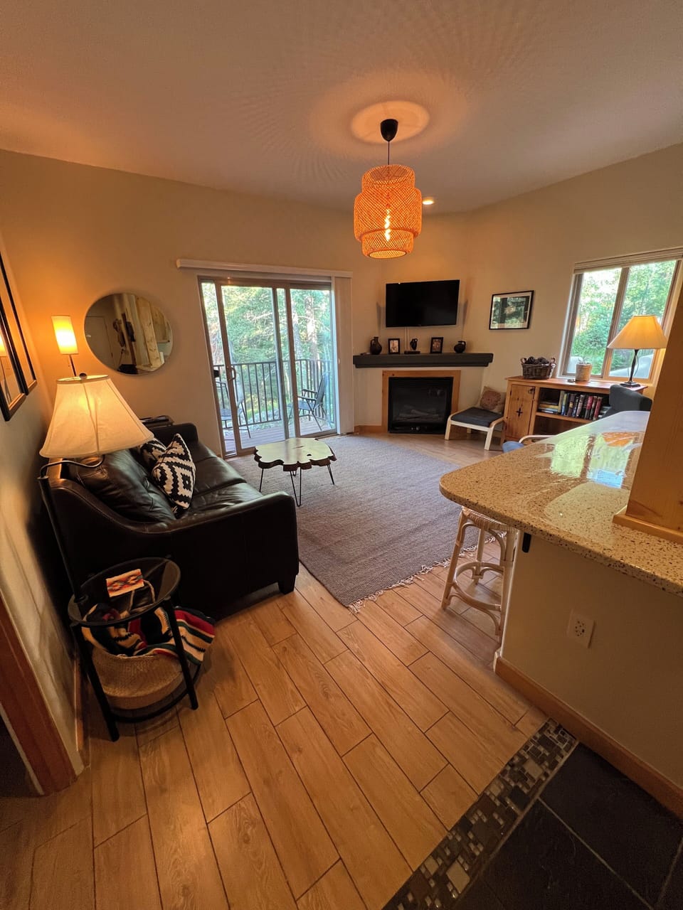 Livingroom with comfy couch that pulls out to a queen size bed.