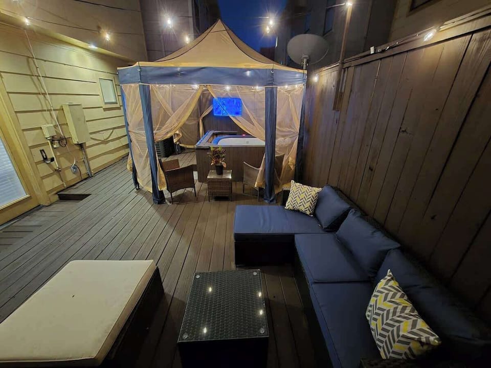 Cozy lounge area with sectional sofa and corner table setup