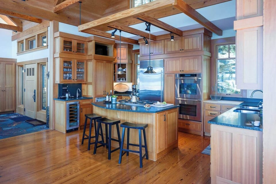 Fully equipped with a blender, food processor, hand mixer, microwave, toaster, drip coffeemaker, grinder, French press, and electric kettle. 