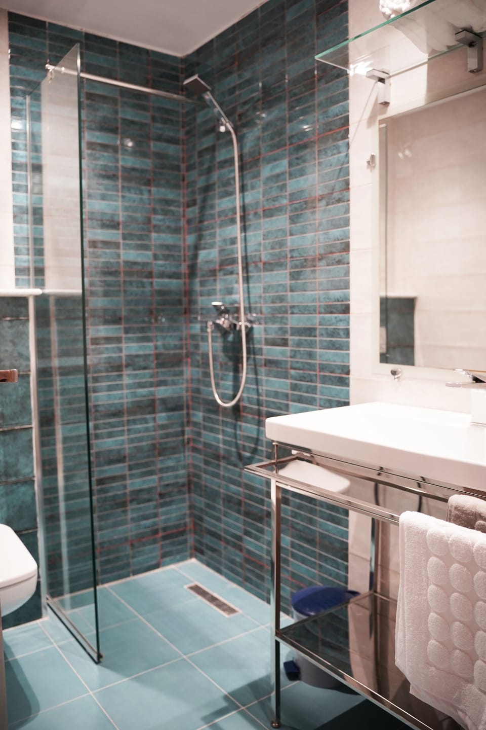 Shower, towels, soap, shampoo