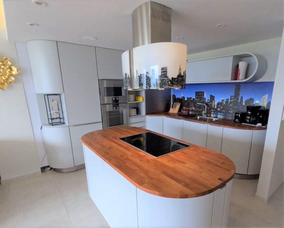 Teak Kitchen with European Chef Utilities