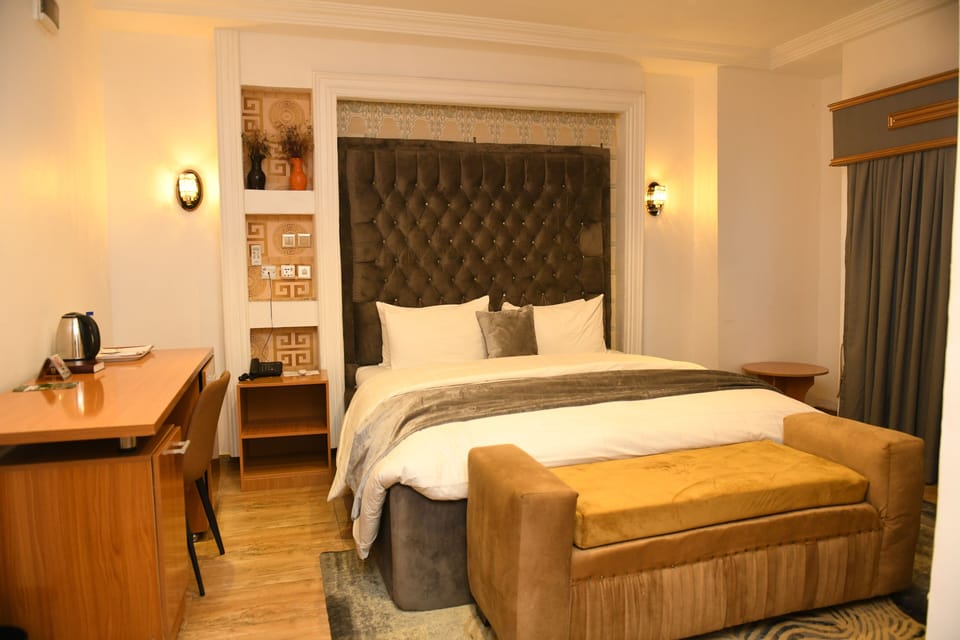 Deluxe Double Room, Balcony, City View | In-room safe, blackout drapes, soundproofing, free WiFi