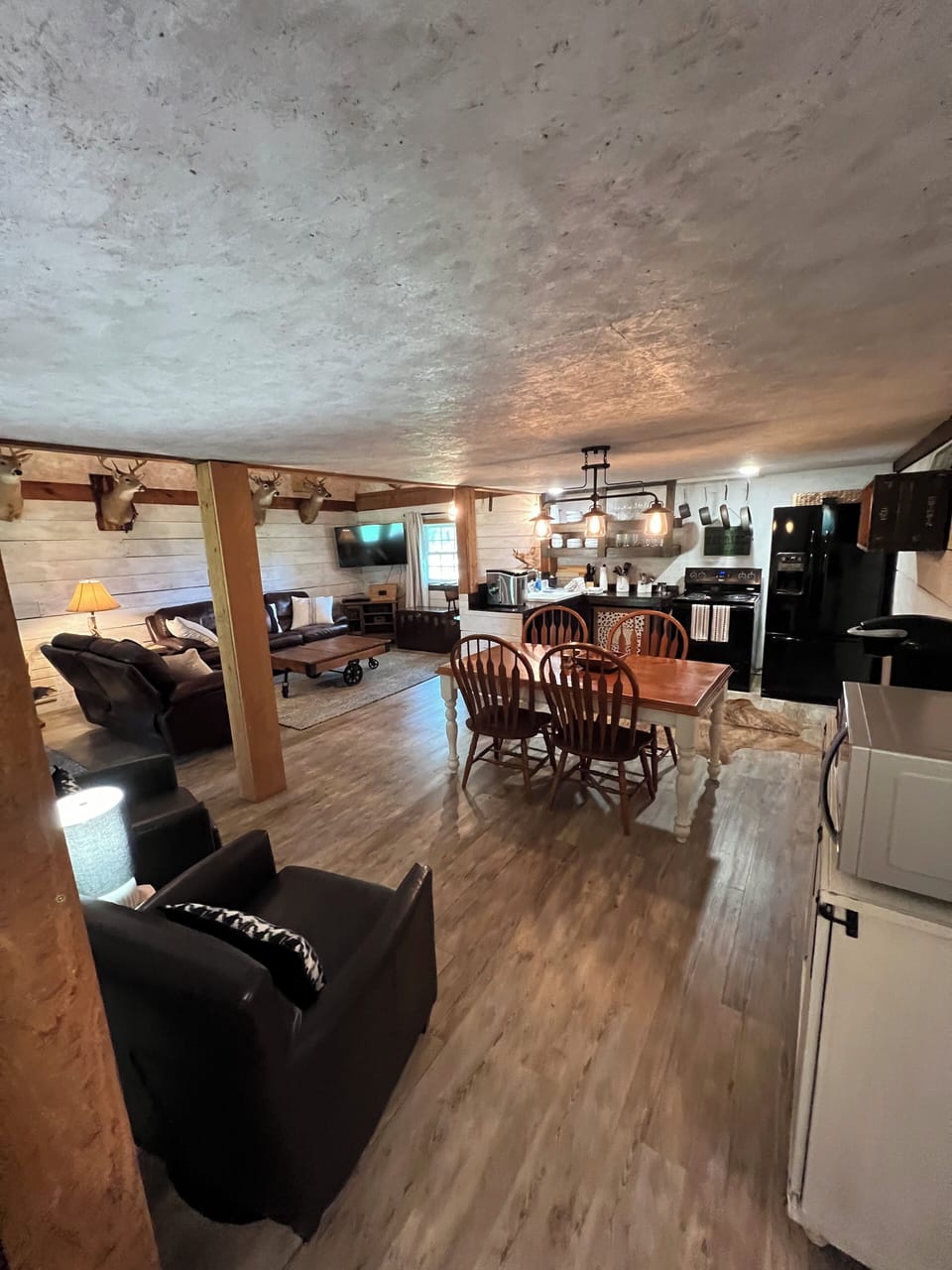 Sitting area overlooks the kitchen and living room