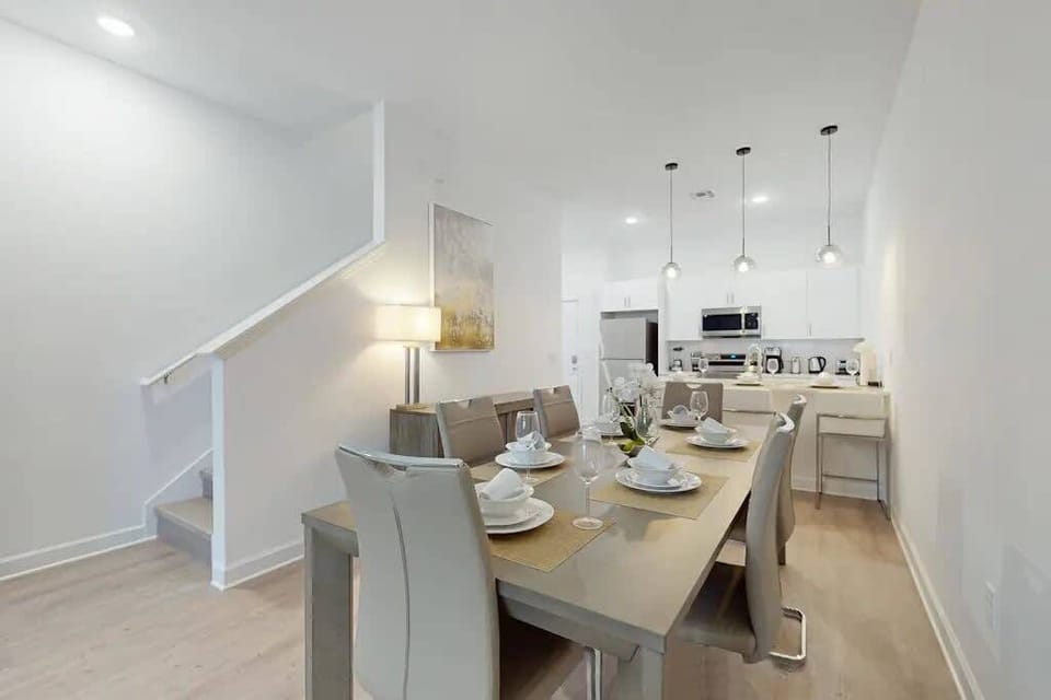 Enjoy meals together in the spacious dining area with ample seating.