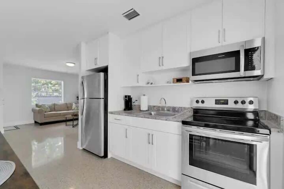 Enjoy the convenience of a full kitchen, complete with modern appliances, ample counter space, and all the essentials you need to prepare delicious meals during your stay.