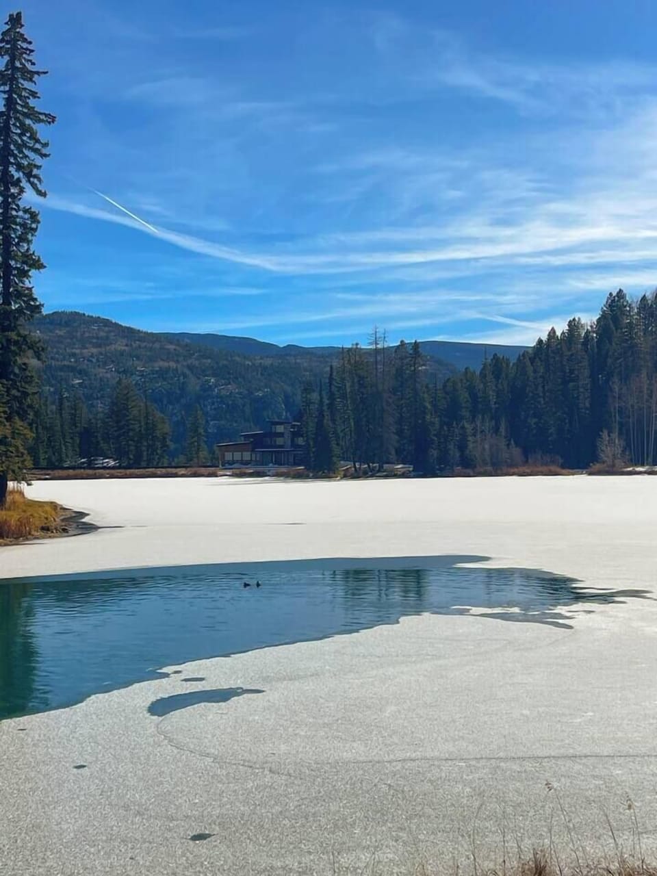 Twilight Lake half frozen, one minute from the door