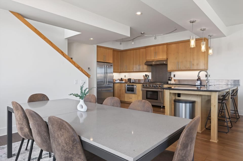 Spacious open-concept kitchen and dining area with modern finishes