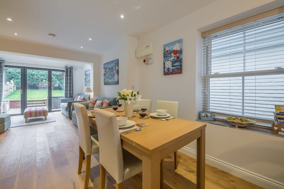 Ground floor: The dining area leads to the sitting room