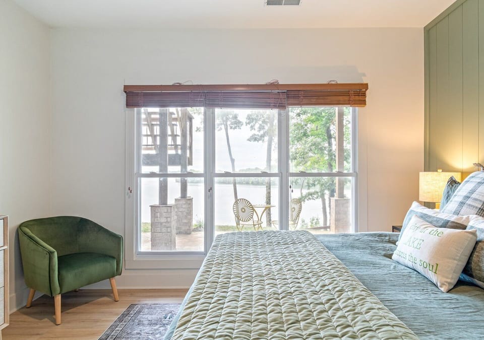 King bed downstairs that provides great views of the water