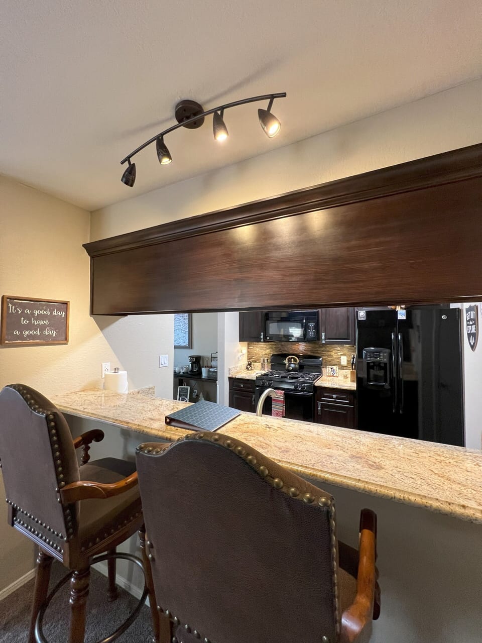 Extra seating at the breakfast bar.  Welcome guide and local information book