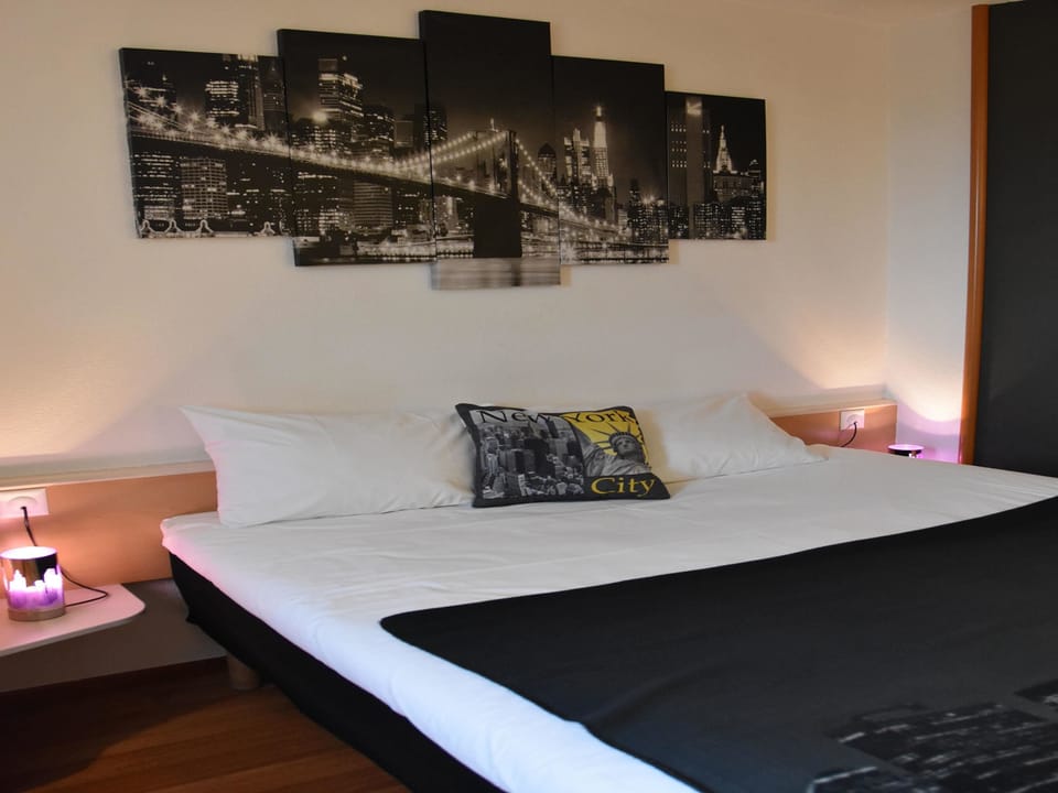 Desk, blackout drapes, soundproofing, iron/ironing board (on request)
