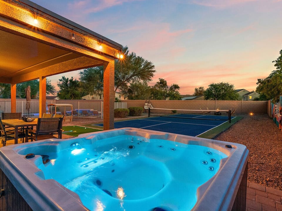 Soak under the stars in your private hot tub oasis at Mirage Peak Manor — perfect for sunset views, relaxation, and unforgettable nights.