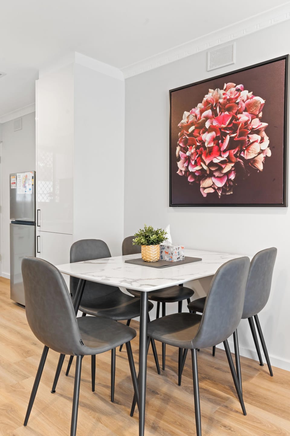 Modern dining area with seating for 5