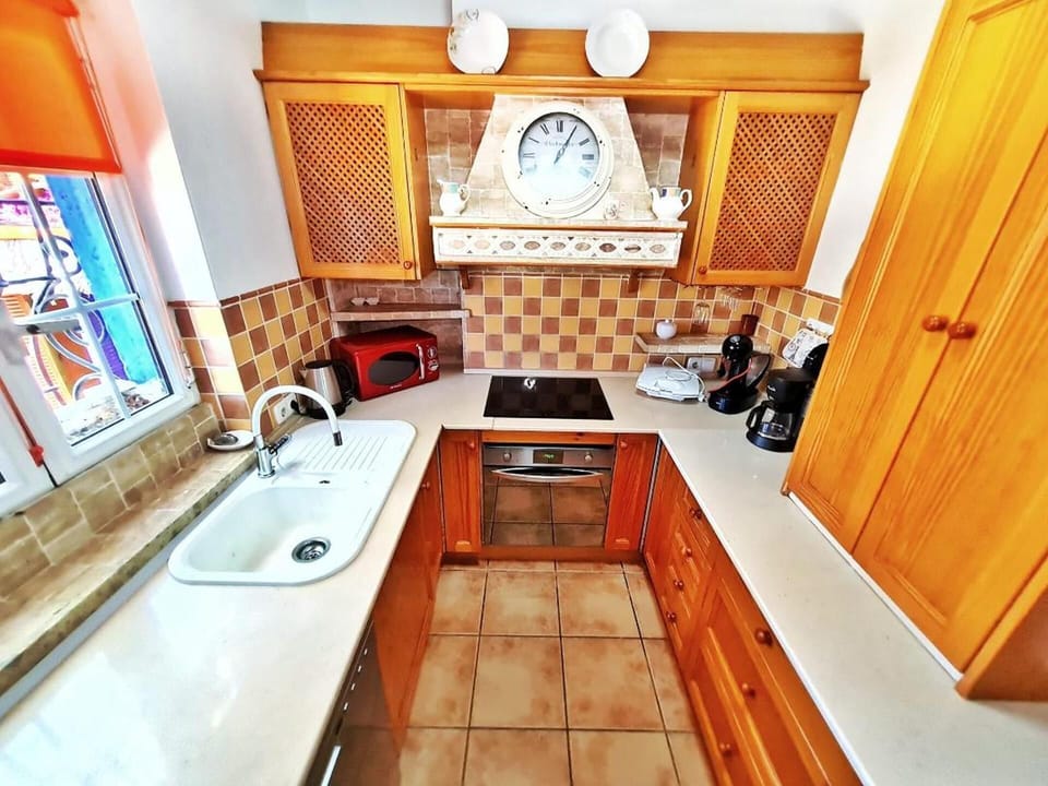Villa | Private kitchen | Fridge, microwave, oven, stovetop